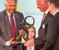 Merrill J. Fernando receiving the Oslo Business for Peace Award